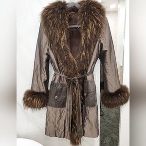 Fur lined coat with fur collar and wrists siz s Small or a size 6?